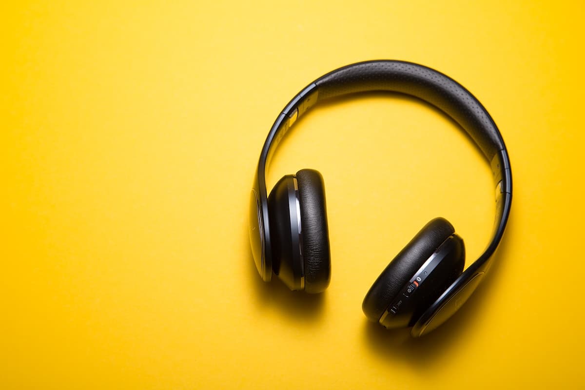 Black over-ear headphones on a light background